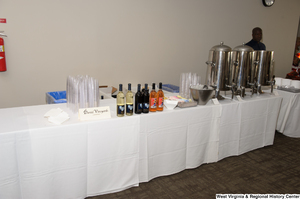 ["A table sits for Daniel Vineyards at the 150th birthday celebration for West Virginia."]%