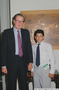 ["Senator John D. (Jay) Rockefeller stands next to a boy from Martinsburg, West Virginia who was named a National Hispanic Youth Scholar."]%