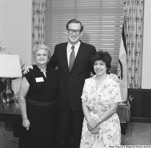 ["Senator John D. (Jay) Rockefeller stands for a photograph in his office with two representatives from West Virginia Free, a non-profit organization that works to protect the reproductive rights of all West Virginia women."]%