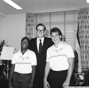 ["Senator John D. (Jay) Rockefeller stands for a photograph with two West Virginia participants in Boys Nation, an annual civic engagement program run by the American Legion."]%