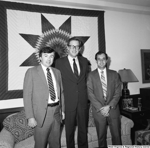 ["Two directors of the VA hospital in Huntington stand for a photograph with Senator John D. (Jay) Rockefeller in his Washington office."]%