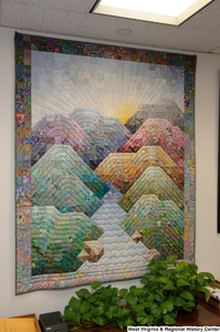 ["A colorful quilt depicting mountains hangs in Senator John D. (Jay) Rockefeller's office."]%