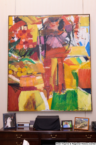 ["An abstract painting hangs on the wall in Senator Rockefeller's office."]%