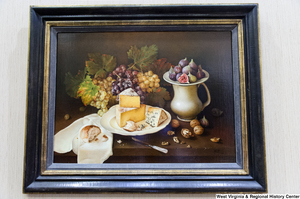 ["A still life painting of food hangs on the wall in Senator John D. (Jay) Rockefeller's office."]%