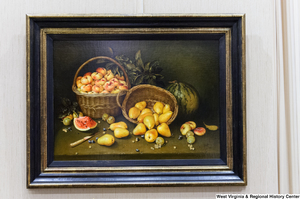 ["A still life painting of fruit hangs on a wall in Senator Rockefeller's office."]%