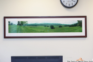 ["A panoramic photograph of a field hangs in Senator Rockefeller's office."]%