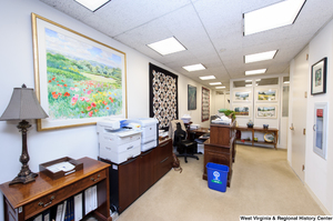 ["This photo shows some of the staff desks in Senator John D. (Jay) Rockefeller's office."]%