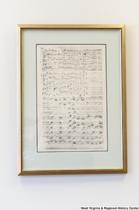 ["Framed sheet music hangs in Senator John D. (Jay) Rockefeller's office."]%