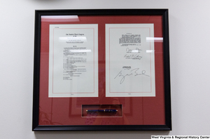 ["A framed copy of 2008 amendments to the Foreign Intelligence Surveillance Act hangs in Senator Rockefeller's office."]%