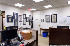 ["The press office in Senator John D. (Jay) Rockefeller's office is full of newspaper clippings on the walls."]%
