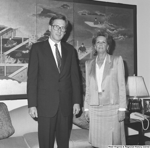 ["Senator John D. (Jay) Rockefeller stands next to a representative of the West Virginia Agency on Aging."]%