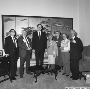 ["Senator John D. (Jay) Rockefeller stands with an unidentified group in his office."]%