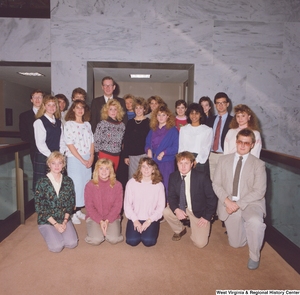 ["This color photograph shows Senator John D. (Jay) Rockefeller standing with a group of students in a hallway in the Hart Building."]%