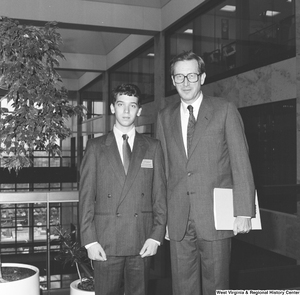 ["Senator John D. (Jay) Rockefeller stands in the Hart Building hallway next to an Environmental Youth Awards winner from West Virginia."]%