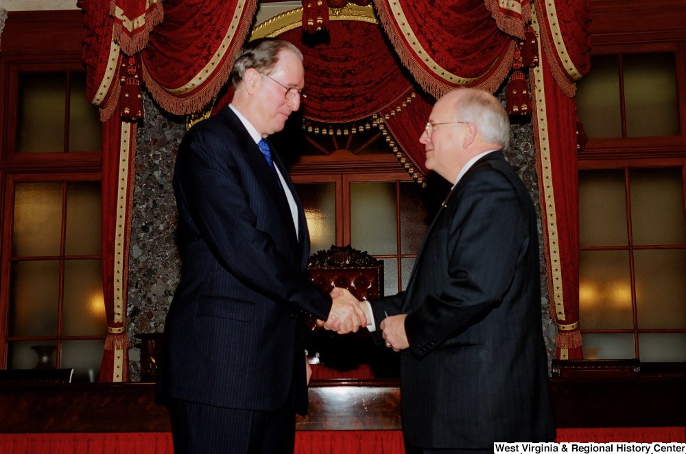 ["Senator John D. (Jay) Rockefeller shakes hands with Vice President Dick Cheney after taking the oath of office for his fourth term."]%