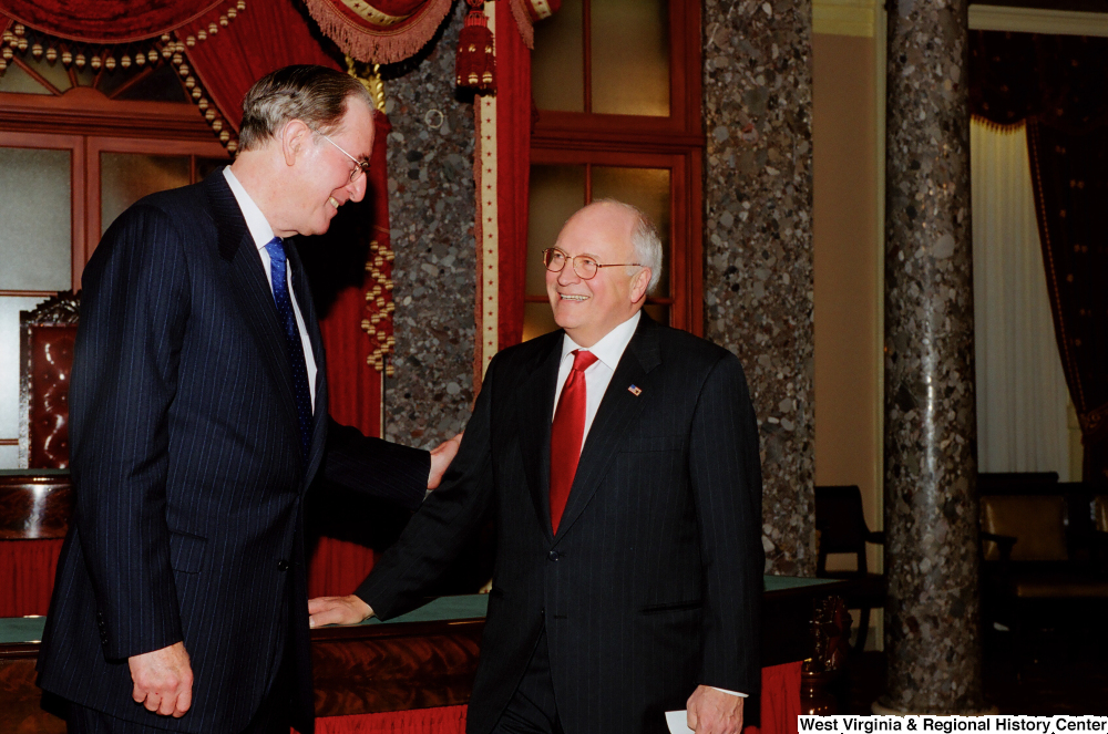 ["Senator John D. (Jay) Rockefeller smiles with Vice President Dick Cheney during his Senate Swearing-In Ceremony."]%