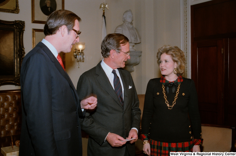 ["Senator John D. (Jay) Rockefeller with wife Sharon Rockefeller and Vice President George H. W. Bush at the Senate Swearing-In Ceremony."]%