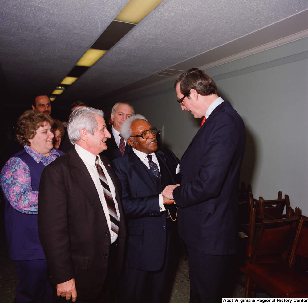 ["Unidentified supporters greet Senator John D. (Jay) Rockefeller after his Senate Swearing-In Ceremony."]%