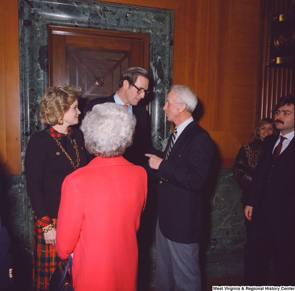 ["Senator John D. (Jay) Rockefeller and his wife Sharon talk with supporters after his Senate Swearing-In Ceremony."]%