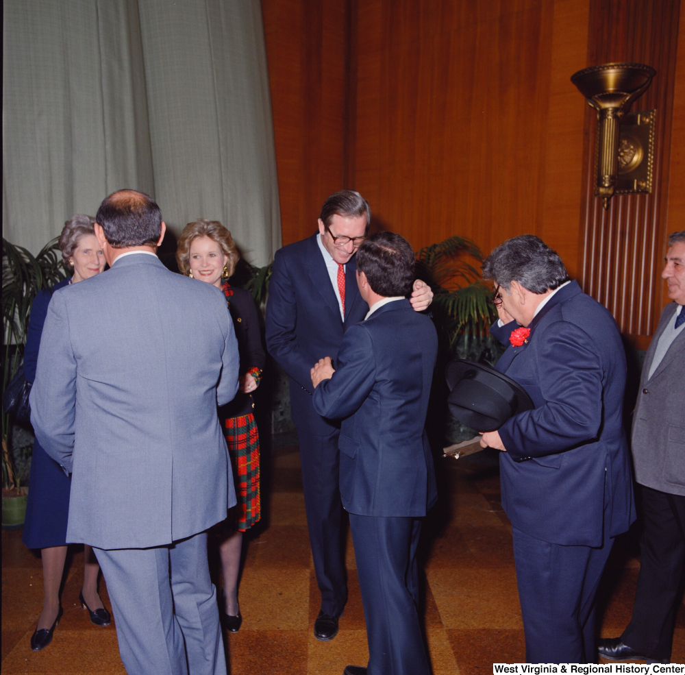 ["Senator John D. (Jay) and Sharon Rockefeller greet supporters following the Senate Swearing-In Ceremony."]%