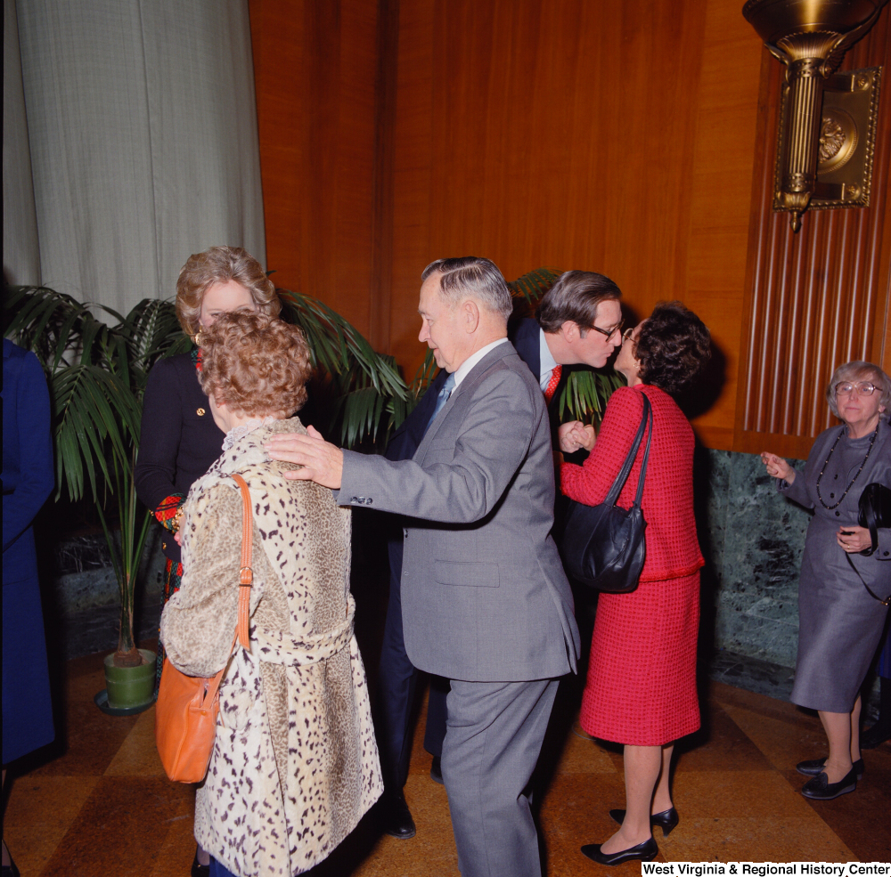 ["Senator John D. (Jay) Rockefeller and his wife Sharon chat with unidentified supporters at the Senate Swearing-In Ceremony."]%