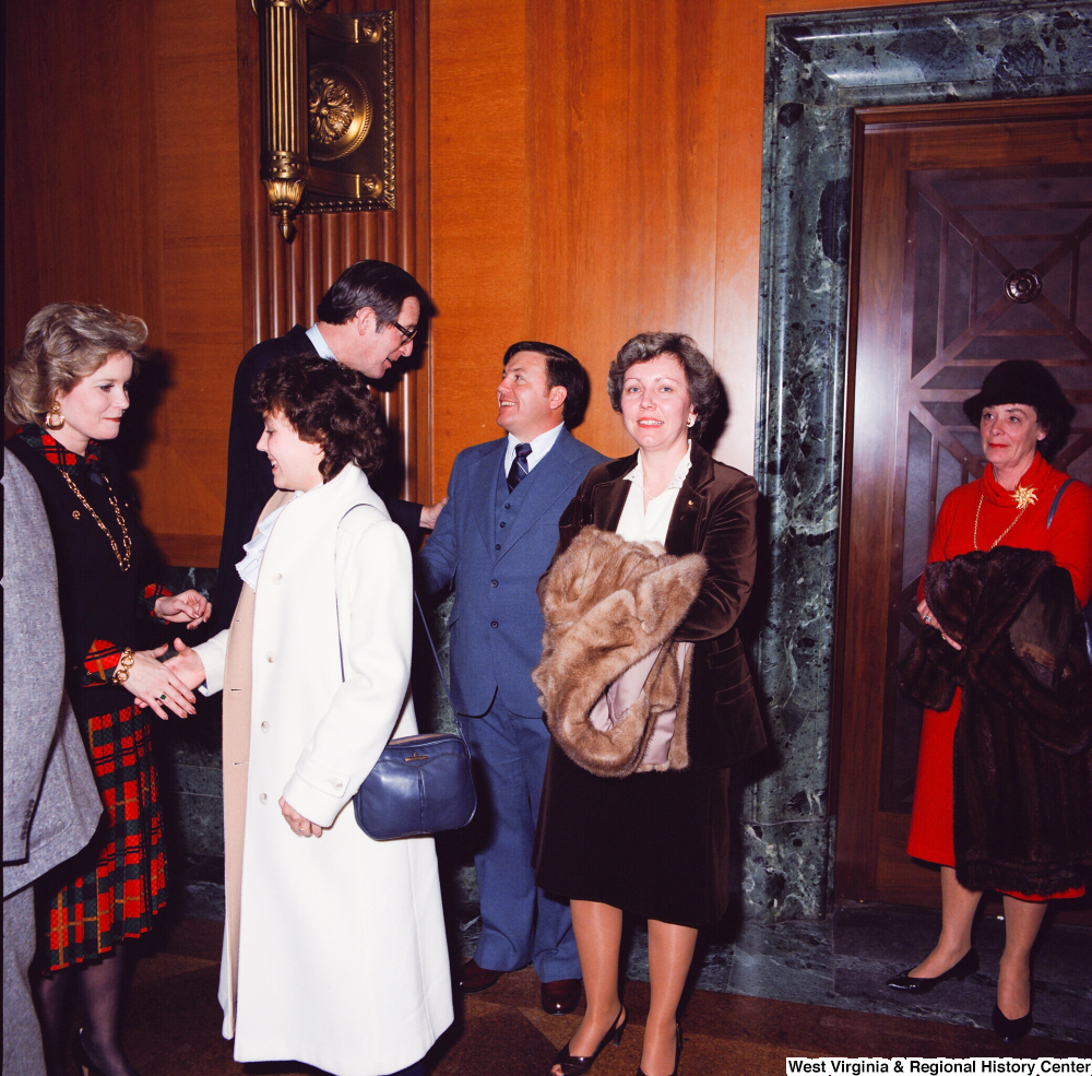 ["Senator John D. (Jay) Rockefeller greets a group of unidentified supporters at the Senate Swearing-In Ceremony."]%