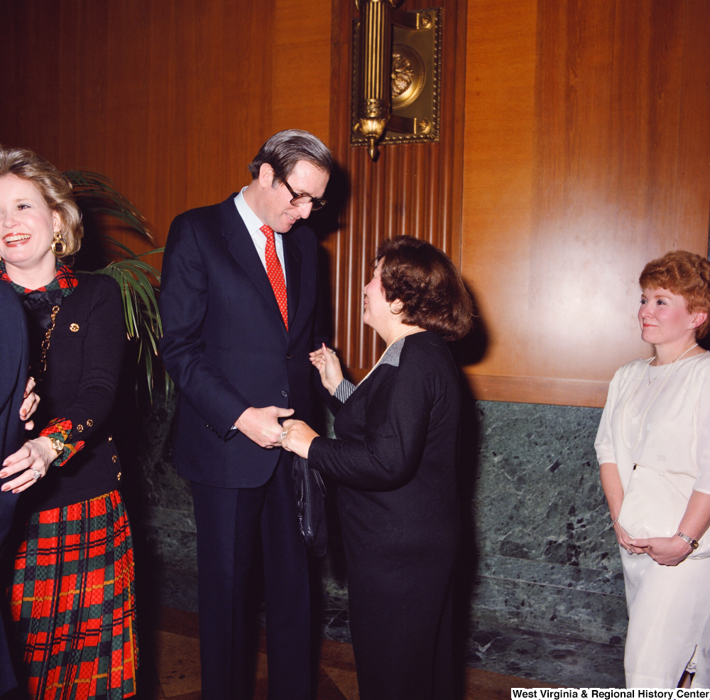 ["Senator John D. (Jay) Rockefeller shakes hands with an unidentified supporter at the Senate Swearing-In Ceremony."]%