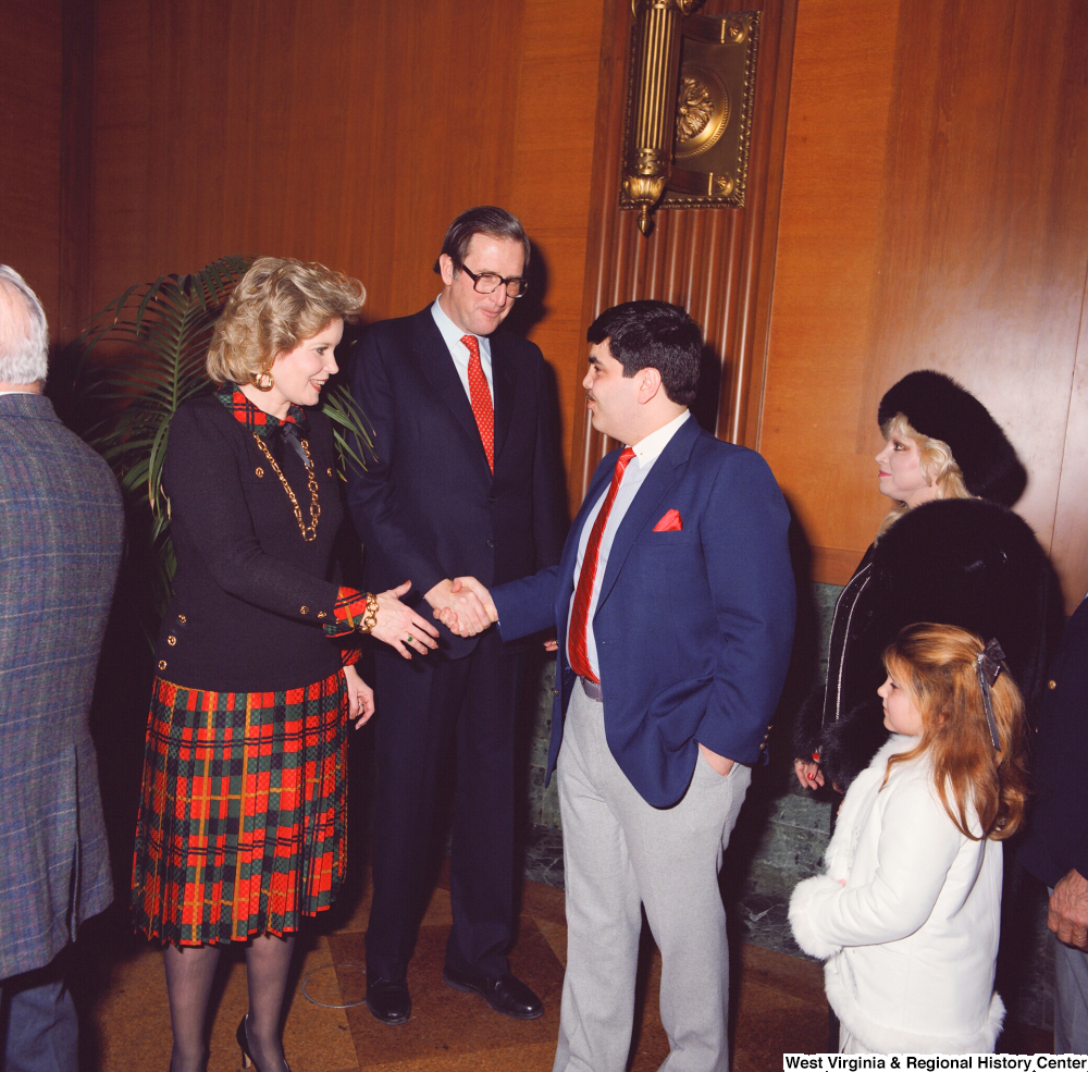 ["Senator John D. (Jay) Rockefeller and his wife Sharon greet unidentified supporters after the Senate Swearing-In Ceremony."]%
