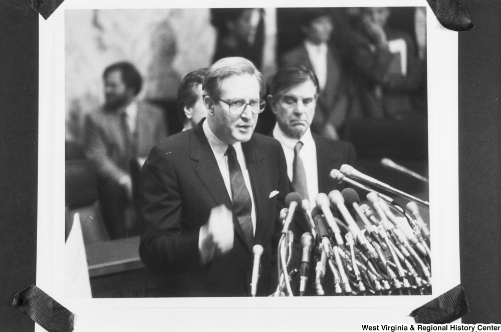 ["This photograph of a photograph shows Senator John D. (Jay) Rockefeller speaking during a press event."]%