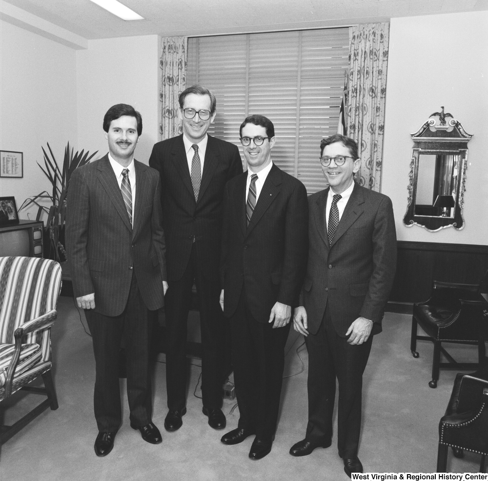 ["Senator John D. (Jay) Rockefeller stands for a photograph in his office with three representatives from the Independent Oil and Gas Association."]%