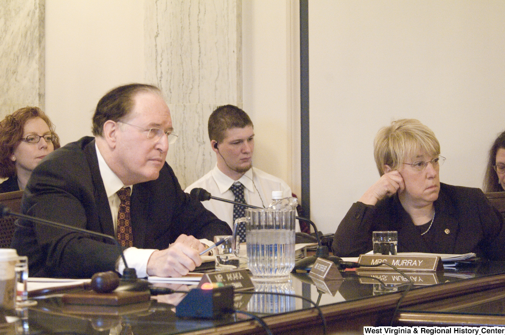 ["Senator John D. (Jay) Rockefeller and Senator Patty Murray listen to testimony during an Intelligence Committee hearing."]%