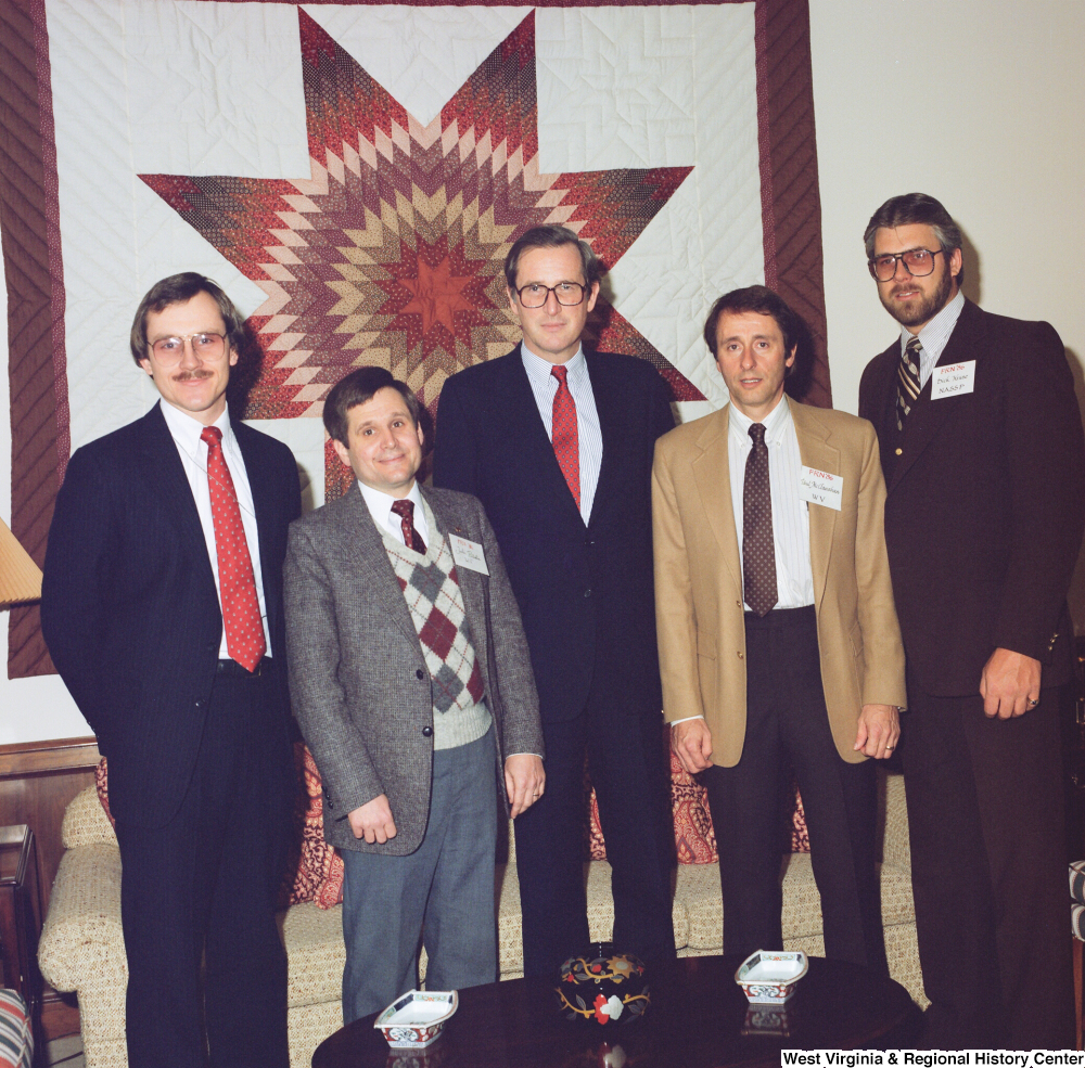 ["In this color photograph, Senator John D. (Jay) Rockefeller stands with four representatives from the West Virginia Family Resource Network."]%