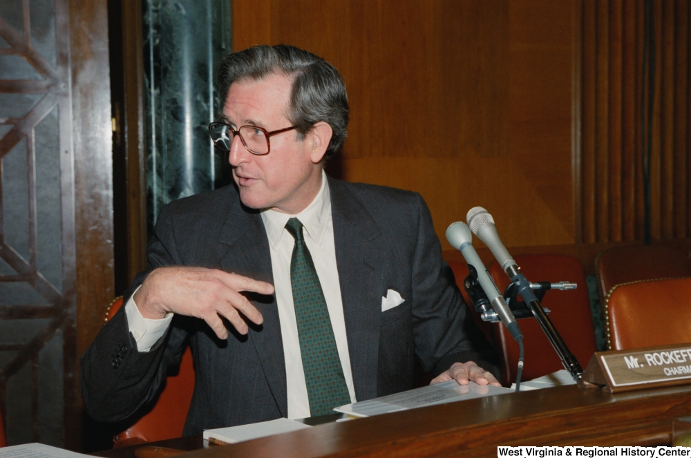 ["Senator John D. (Jay) Rockefeller sits at a Senate sub-committee hearing."]%