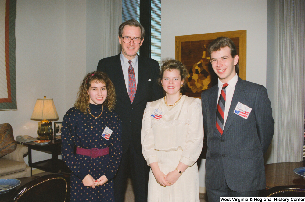 ["Senator John D. (Jay) Rockefeller stands with three West Virginia participants in the Presidential Classroom program."]%