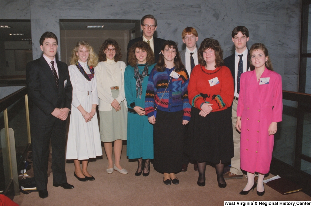 ["Senator John D. (Jay) Rockefeller stands with student participants in the National Young Leaders Conference."]%