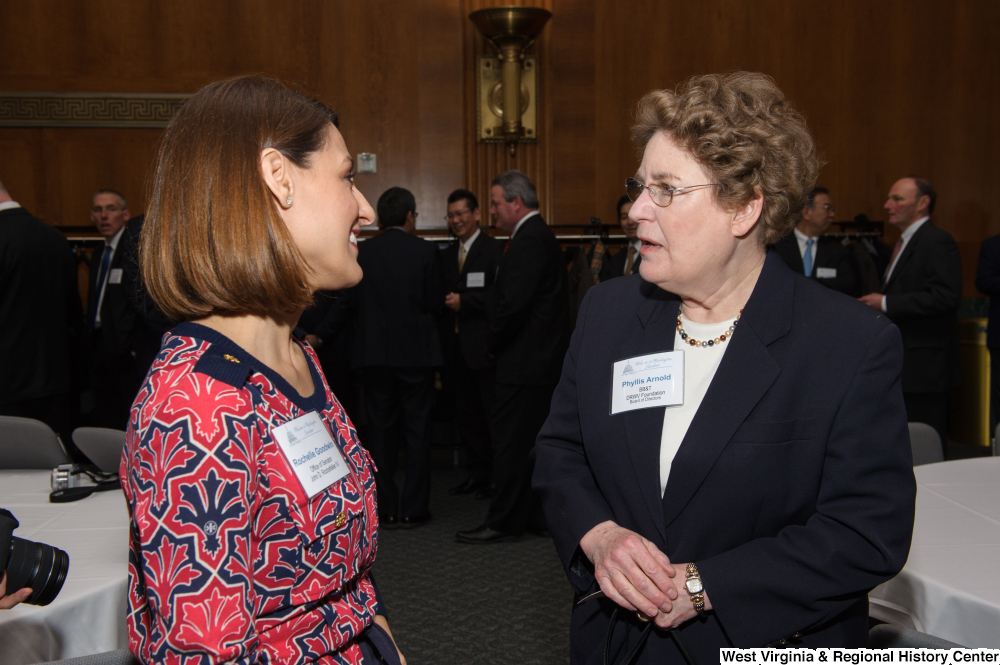 ["Rochelle Goodwin speaks with a BB&T executive at a Welcome to Washington luncheon."]%