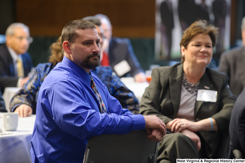 ["Unidentified individuals sit at the Welcome to Washington luncheon."]%