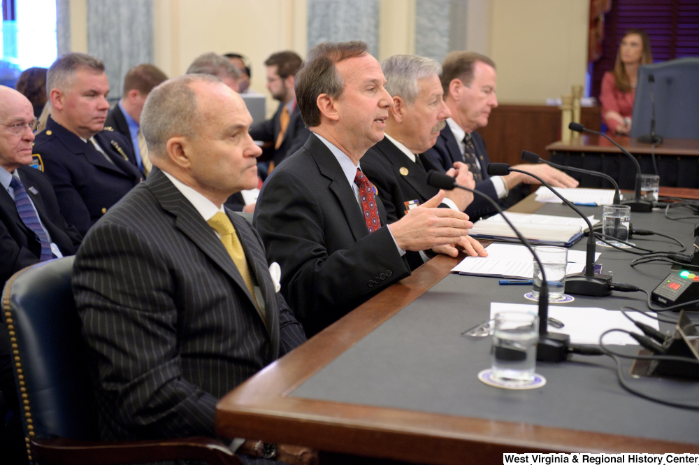 ["Four national security officials speak to the Senate Commerce Committee hearing titled \"Safeguarding Our Future: Building a Nationwide Network for First Responders.\""]%