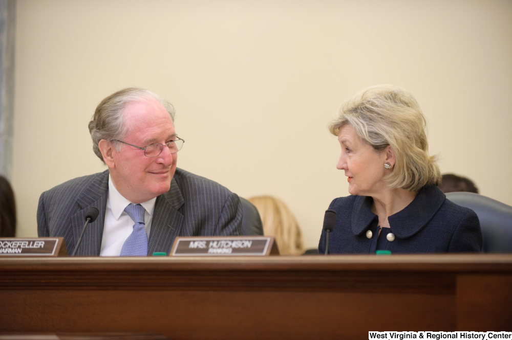 ["Senators John D. (Jay) Rockefeller and Kay Hutchison look at one another during a Commerce Committee hearing titled \"Safeguarding Our Future: Building a Nationwide Network for First Responders.\""]%