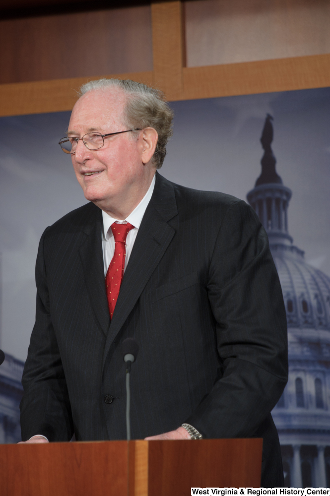 ["Senator John D. (Jay) Rockefeller laughs as he speaks at a Senate press event."]%