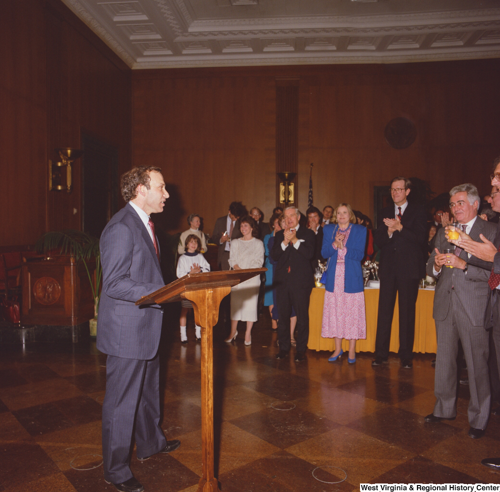["A member of Senator John D. (Jay) Rockefeller's staff speaks at an event at the Senate."]%