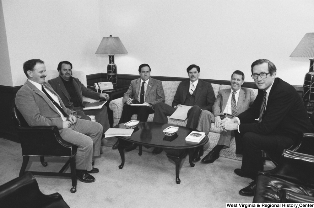 ["Senator John D. (Jay) Rockefeller meets with an unidentified group of unemployed miners in his office."]%