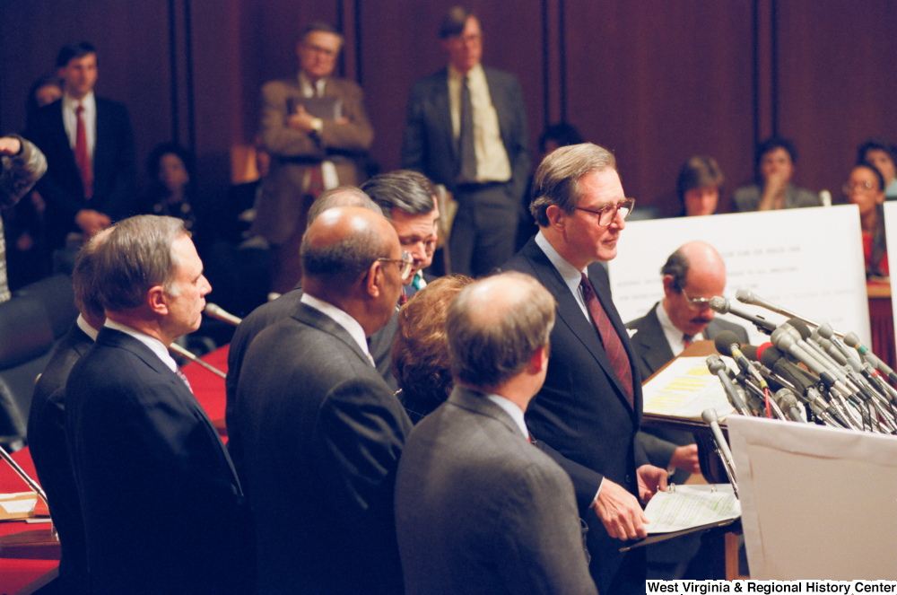 ["Senator John D. (Jay) Rockefeller stands and looks out at the media after a Pepper Commission press event."]%