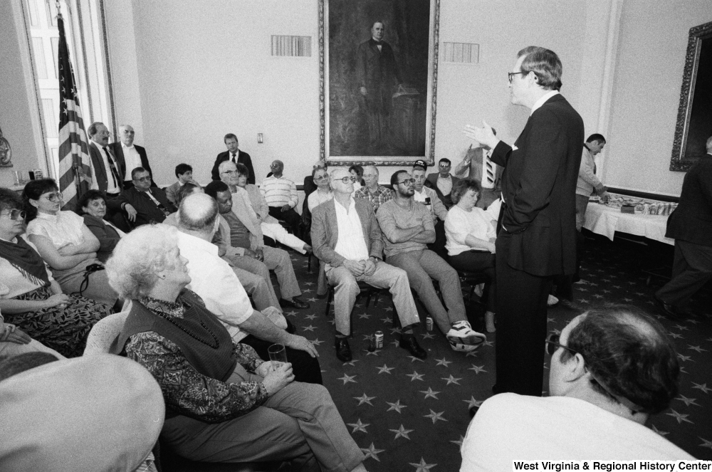 ["Senator John D. (Jay) Rockefeller answers questions during a discussion with the audience at a black lung event in the Senate."]%