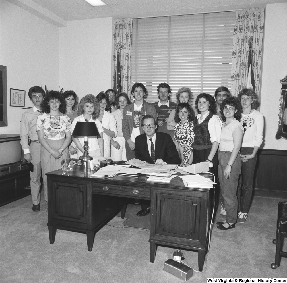 ["Senator John D. (Jay) Rockefeller sits for a picture with an unidentified student group in his Washington office."]%