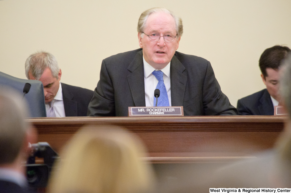 ["Senator John D. (Jay) Rockefeller sits at a Commerce Committee hearing."]%