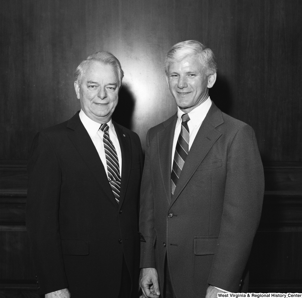 ["Senator Robert C. Byrd stands for a photograph with West Virginia University President Neil S. Bucklew."]%