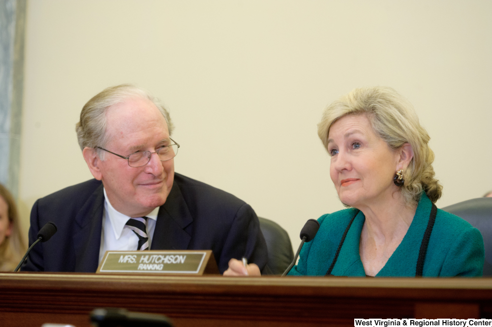 ["Senators John D. (Jay) Rockefeller and Kay Hutchison sit during a Commerce Committee hearing."]%