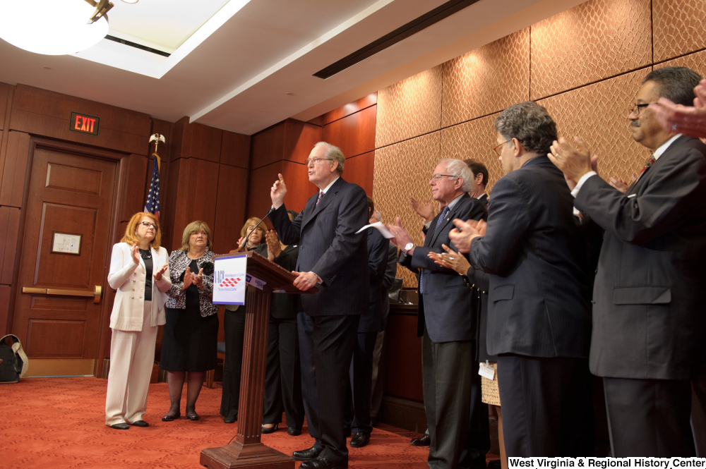 ["Senator John D. (Jay) Rockefeller gets an applause from his colleagues as he speaks at an event for the National Association of Counties."]%