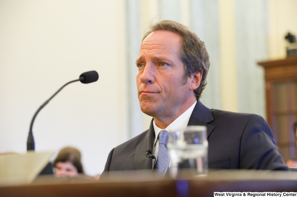 ["Mike Rowe sits at a Senate Commerce Committee hearing."]%